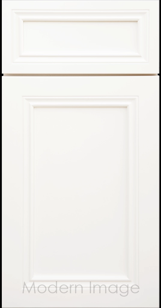 Close-up of Corona cabinets in Frost White with mitered molding and flat center panel.